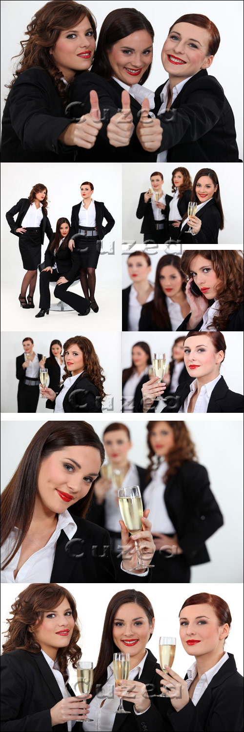     / Businesswomen giving the thumb's up - Stock photo